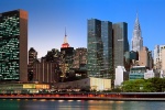 An ultra-high-resolution panoramic skyline photo of Midtown East, the United Nations and Chrysler Building transitioning from day to night, from Andrew's 'Night & Day' series.