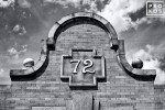 An architectural detail from the 72nd street subway station on Manhattan's Upper West Side in black and white
