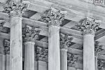 A black and white close-up architectural detail of the Corinthian columns from the United States Capitol Building East Front, Washington DC