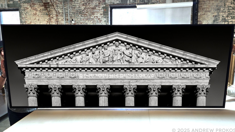 A 90 inch wide black and white framed photo of the US Supreme Court pediment in Washington DC by architectural photographer Andrew Prokos