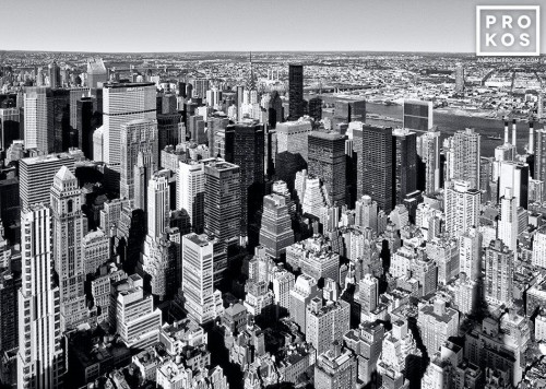 A black and white aerial view of the skyscrapers of Midtown Manhattan, New York City