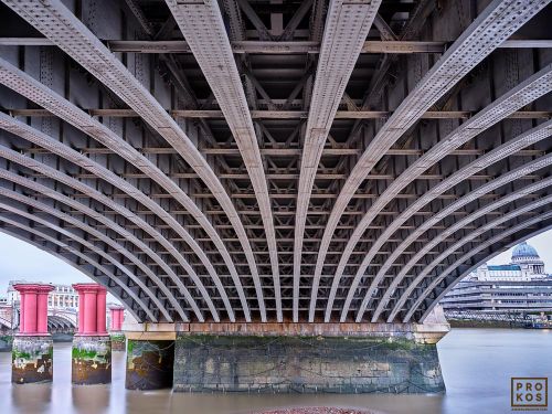 A four minute long-exposure photo of the underspan of Blackfriars Bridge and the Thames River in London, UK. Limited edition fine art prints of this photo are available up to 80 inches in width and framed in various wood, metal, and acrylic styles.