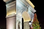 A fine art night photo of the arch in Washington Square Park at Christmas.
