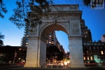 An architectural photo of the monumental arch at Washington Square at night, New York City