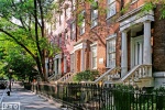 A row of elegant townhouses along Washington Square North in Greenwich Village, New York City. Fine art prints of this photo are available framed in various styles, please inquire. 