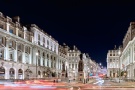 A panoramic view of Waterloo Place and Pall Mall seen at night, London, United Kingdom. Large-scale limited edition prints of this color photo are available up to 120 inches in width.
