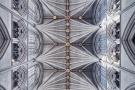 A color fine art photograph of the gothic interior of Westminster Abbey looking upward at the ornate nave vault, London, England. Limited edition prints of this photograph are available up to 60 inches in height.