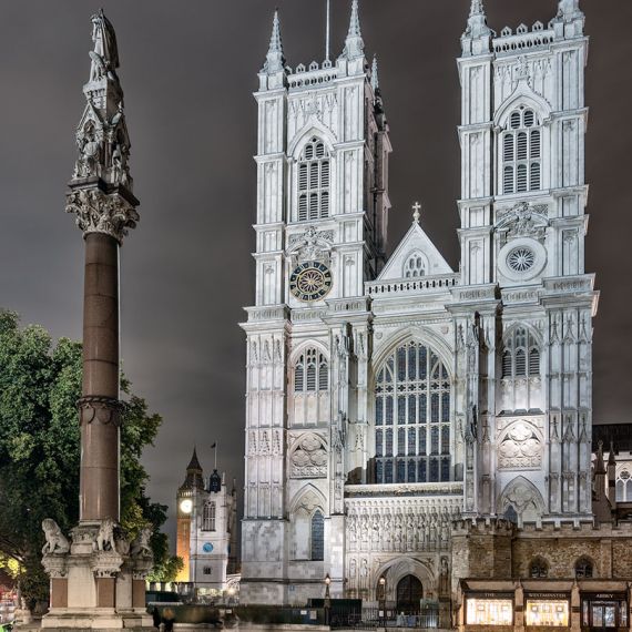 A large-format color photo of Westminster Abbey's west entrance as seen at night, London, United Kingdom. Limited edition fine art prints of this photo are available up to 72 inches in height and framed in various wood, metal and acrylic styles.