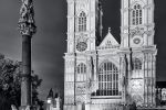 A black and white view of Westminster Abbey's west entrance at night, London, United Kingdom. The Abbey's western towers were completed in 1745 in the Gothic Revival style. Limited edition fine art prints of this photo are available up to 72 inches in height and framed in various wood, metal and acrylic styles.