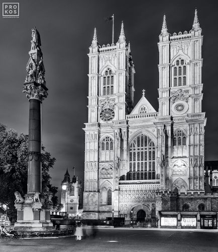 A black and white view of Westminster Abbey's west entrance at night, London, United Kingdom. The Abbey's western towers were completed in 1745 in the Gothic Revival style. Limited edition fine art prints of this photo are available up to 72 inches in height and framed in various wood, metal and acrylic styles.