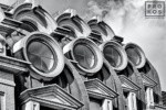 A fine art architectural photo of the windows of the famous Willard Hotel in black and white, Washington DC