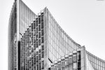 A black and white architectural view of the curved facades of the Willis Building in the City of London, by architect Sir Norman Foster. Limited edition black and white prints of this photo are available up to 72 inches in width.
