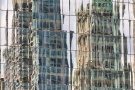 Fine Art Photography - Reflections of skyscrapers on a polished glass facade in Lower Manhattan