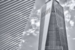 A black and white architectural photo of One World Trade Center and a wing of the Oculus, New York City. Large-scale framed prints of this photo are available up to 72 inches in height.