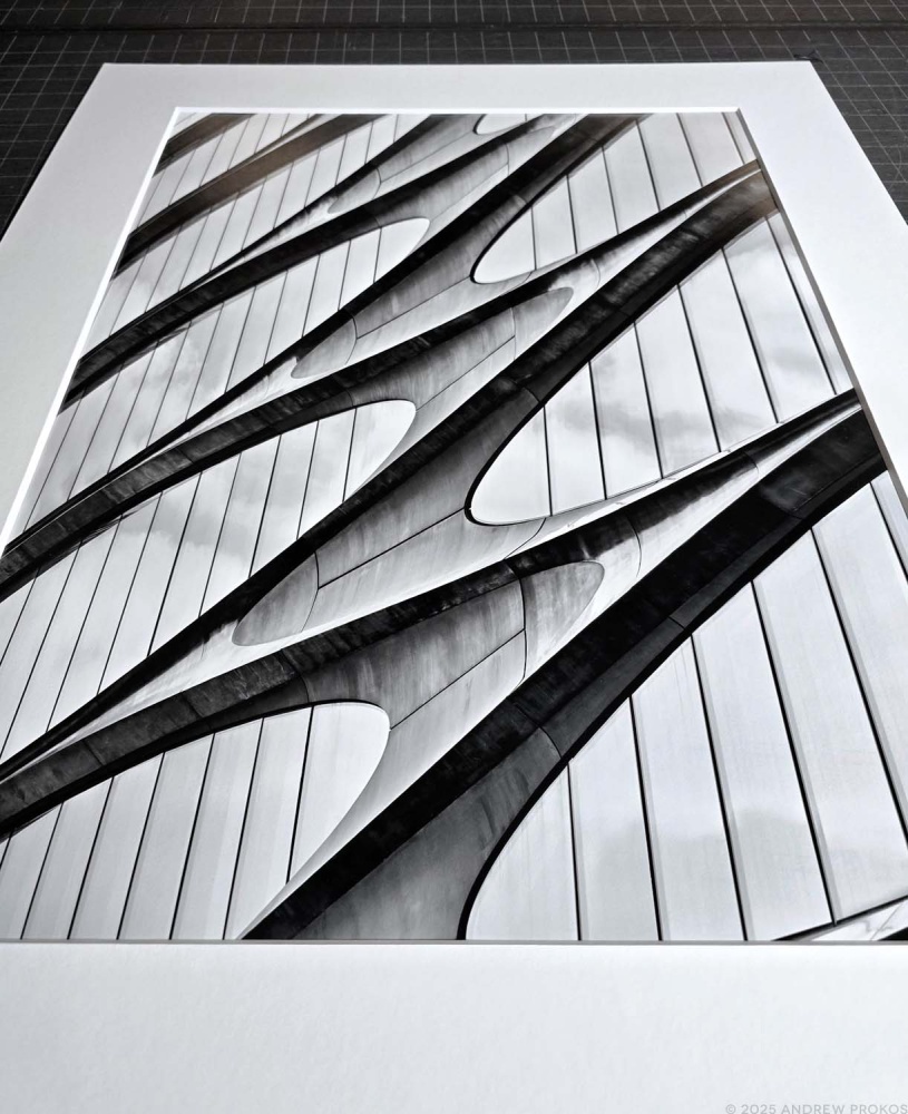 A thirty inch black and white architectural print of the Zaha Hadid building in New York's Highline district by photographer Andrew Prokos.