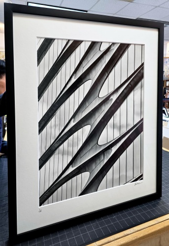 A 36 inch black and white architectural print of the Zaha Hadid building in New York's Highline district by photographer Andrew Prokos.
