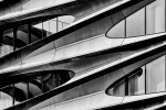 Black and white architectural photography of the facade of the Zaha Hadid Building at 520 West 28th Street, in the West Chelsea / High Line area of Manhattan, New York City. Large-scale framed prints of this photo are available up to 80 in. and framed in contemporary wood, metal, and acrylic styles