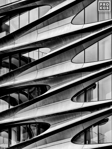 Black and white architectural photography of the facade of the Zaha Hadid Building at 520 West 28th Street, in the West Chelsea / High Line area of Manhattan, New York City. Large-scale framed prints of this photo are available up to 80 in. and framed in contemporary wood, metal, and acrylic styles