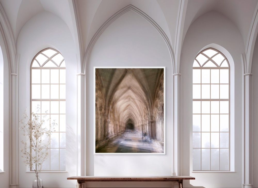 A framed large format print of "Multiplicity - Westminster Abbey Cloister" by Photographer Andrew Prokos, seen hanging in a luxury interior.